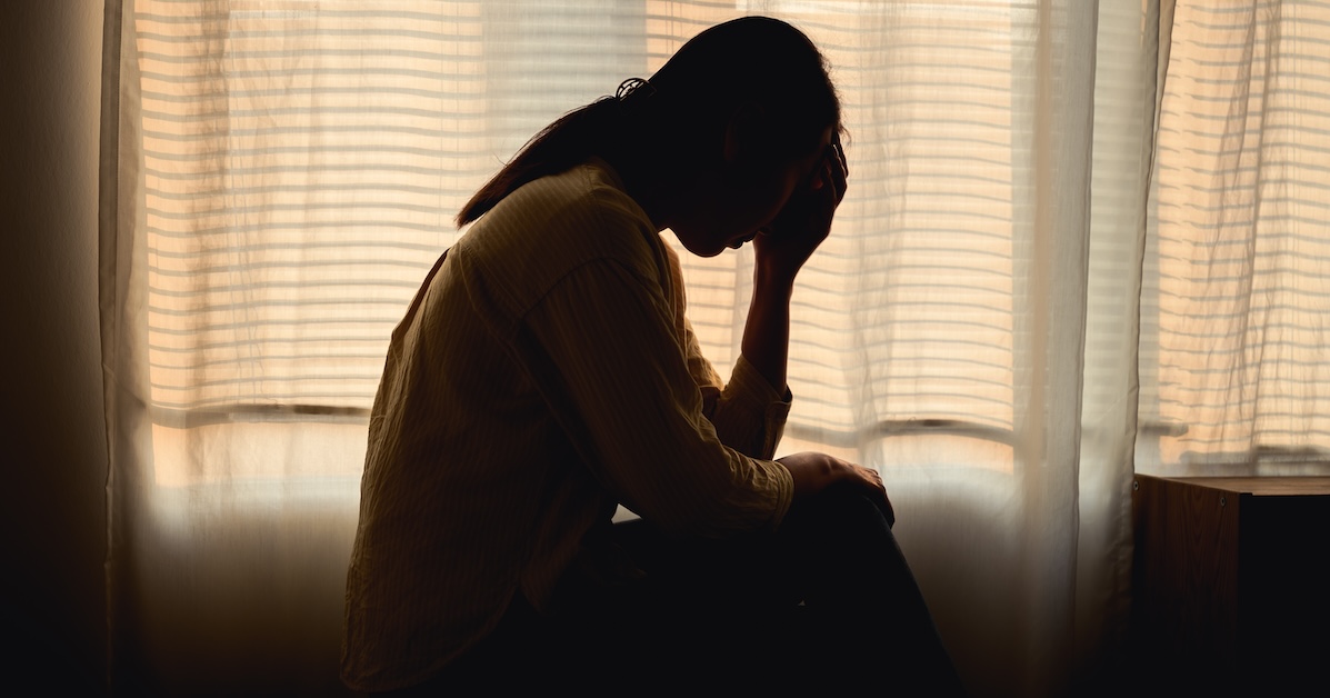 Silhouette,Photo,Of,Young,Asian,Woman,Feeling,Upset,,Sad,,Unhappy